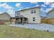 Exterior view of the home showcasing the patio, gazebo, backyard, and well-maintained siding at 1603 Maston Rd, Auburn, GA 30011