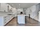 The spacious kitchen is equipped with modern appliances, ample counter space, and a stylish island with a sink at 1603 Maston Rd, Auburn, GA 30011