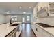 Bright kitchen featuring white cabinetry, countertops, and stainless steel appliances at 1603 Maston Rd, Auburn, GA 30011