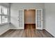 Well-lit office featuring double doors and hardwood floors, great for private conversations and work at 1603 Maston Rd, Auburn, GA 30011