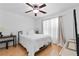 Inviting bedroom with hardwood floors, soft natural light, and a ceiling fan at 1783 Drew Nw Dr, Atlanta, GA 30318
