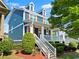 Charming two-story home with inviting front porch, beautiful columns, and well-manicured landscaping at 1783 Drew Nw Dr, Atlanta, GA 30318