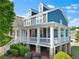 Charming two-story home with blue siding, white trim, and a inviting front porch at 1783 Drew Nw Dr, Atlanta, GA 30318