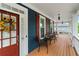 Inviting front porch features a wooden deck with seating and charming decorative elements at 1783 Drew Nw Dr, Atlanta, GA 30318