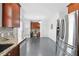 Spacious kitchen with stainless steel appliances, granite counters, and a cozy breakfast nook at 1783 Drew Nw Dr, Atlanta, GA 30318