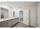 Elegant bathroom featuring a double sink vanity and modern fixtures at 3970 Brushy St, Powder Springs, GA 30127