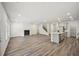 Spacious living area with hardwood floors, a fireplace, and an open layout perfect for entertaining at 3970 Brushy St, Powder Springs, GA 30127