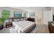 Spacious main bedroom with modern decor and serene artwork at 3970 Brushy St, Powder Springs, GA 30127