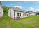 New construction home with a white exterior, a green lawn, and a black roof at 3974 Brushy St, Powder Springs, GA 30127