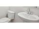 Bathroom with white sink and toilet at 3974 Brushy St, Powder Springs, GA 30127