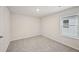 Bedroom with natural light, neutral carpet and white walls with a window at 3974 Brushy St, Powder Springs, GA 30127