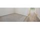 Spacious bedroom with neutral carpet, natural light, and a walk-in closet at 3974 Brushy St, Powder Springs, GA 30127