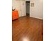 Bedroom with wood floors, neutral walls, and walk-in closet at 4585 Post Ridge Ln, Lithonia, GA 30038