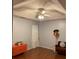 Simple bedroom with wood floors, ceiling fan, and natural light at 4585 Post Ridge Ln, Lithonia, GA 30038
