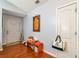 Inviting entryway features hardwood floors, a bench, and space for coats and shoes by the front door at 4585 Post Ridge Ln, Lithonia, GA 30038