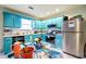 Bright eat-in kitchen with stainless steel appliances, tiled floor and window with lots of natural light at 4585 Post Ridge Ln, Lithonia, GA 30038
