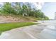 Wide open backyard featuring a basketball court, lush lawn and a privacy fence at 1349 Mckinsey Rdg, Loganville, GA 30052