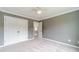 Bedroom featuring carpet, ceiling fan, and closet at 1349 Mckinsey Rdg, Loganville, GA 30052