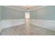 Inviting living room showcasing gorgeous flooring, and trim work at 1349 Mckinsey Rdg, Loganville, GA 30052