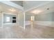 Open-concept living room featuring beautiful flooring and elegant trim at 1349 Mckinsey Rdg, Loganville, GA 30052