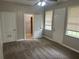 This bedroom has carpeted floors and closet space and natural light at 2076 Garden Cir, Decatur, GA 30032