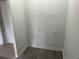 The laundry room has gray wood-look flooring and plenty of space for cleaning at 2076 Garden Cir, Decatur, GA 30032