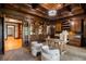 Executive office space with custom woodwork, display cases, and comfortable seating for a productive work environment at 939 Middle Fork Trl, Suwanee, GA 30024