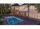 A captivating backyard featuring an inviting pool perfect for relaxation and summer fun at 939 Middle Fork Trl, Suwanee, GA 30024