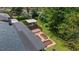 Aerial view of a home with a large deck, pergola, and garden beds at 1436 Diamond Head Drive Dr, Decatur, GA 30033