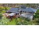 Overhead view of a home with a covered patio, expansive deck and a well-manicured backyard at 1436 Diamond Head Drive Dr, Decatur, GA 30033