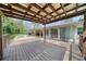 Large wooden back deck with wooden pergola and direct access to the house at 1436 Diamond Head Drive Dr, Decatur, GA 30033
