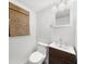 Stylish half-bath with unique vanity and modern fixtures at 1436 Diamond Head Drive Dr, Decatur, GA 30033