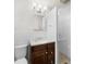 Bathroom featuring white subway tile, wooden vanity, and walk-in shower at 1436 Diamond Head Drive Dr, Decatur, GA 30033