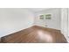 Bedroom with hardwood floors, two windows, and closet space at 1436 Diamond Head Drive Dr, Decatur, GA 30033