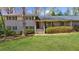Inviting two-story brick home with classic design elements and mature trees at 1436 Diamond Head Drive Dr, Decatur, GA 30033