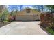 Detached garage with basketball hoop and extended driveway at 1436 Diamond Head Drive Dr, Decatur, GA 30033