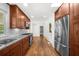 Beautiful kitchen boasts modern appliances, sleek cabinetry, and hardwood floors at 1436 Diamond Head Drive Dr, Decatur, GA 30033