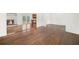 Spacious living room with fireplace and view of kitchen with island, perfect for entertaining at 1436 Diamond Head Drive Dr, Decatur, GA 30033