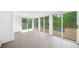 Bright living room with large sliding glass doors leading to outdoor space at 1436 Diamond Head Drive Dr, Decatur, GA 30033