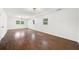 Spacious living room with hardwood floors and multiple windows providing natural light at 1436 Diamond Head Drive Dr, Decatur, GA 30033