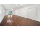 Large, open living area with hardwood floors, multiple windows, and ample closet space at 1436 Diamond Head Drive Dr, Decatur, GA 30033