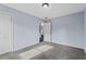 Bedroom featuring light-blue walls and an open doorway to another room at 1931 Selwyn Dr, Decatur, GA 30035