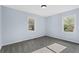 Spacious bedroom with two windows offering a scenic outdoor view at 1931 Selwyn Dr, Decatur, GA 30035