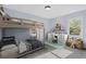 Bright bedroom featuring a bunk bed, desk, and ample natural light at 1931 Selwyn Dr, Decatur, GA 30035