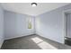 Bedroom with a window offering outside views and a standard closet at 1931 Selwyn Dr, Decatur, GA 30035