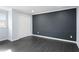 Room showcasing gray wood-like flooring and standard-sized closet at 1931 Selwyn Dr, Decatur, GA 30035