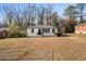 Charming home with black trim and a well-maintained front yard at 1931 Selwyn Dr, Decatur, GA 30035