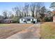 Exterior of the house with long driveway at 1931 Selwyn Dr, Decatur, GA 30035
