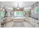 Luxurious bathroom with a soaking tub, dual vanities, and designer finishes at 240 Rose Ridge Dr, Canton, GA 30115