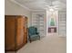 Spacious bedroom boasts built-in bookcases and a view to separate office at 240 Rose Ridge Dr, Canton, GA 30115